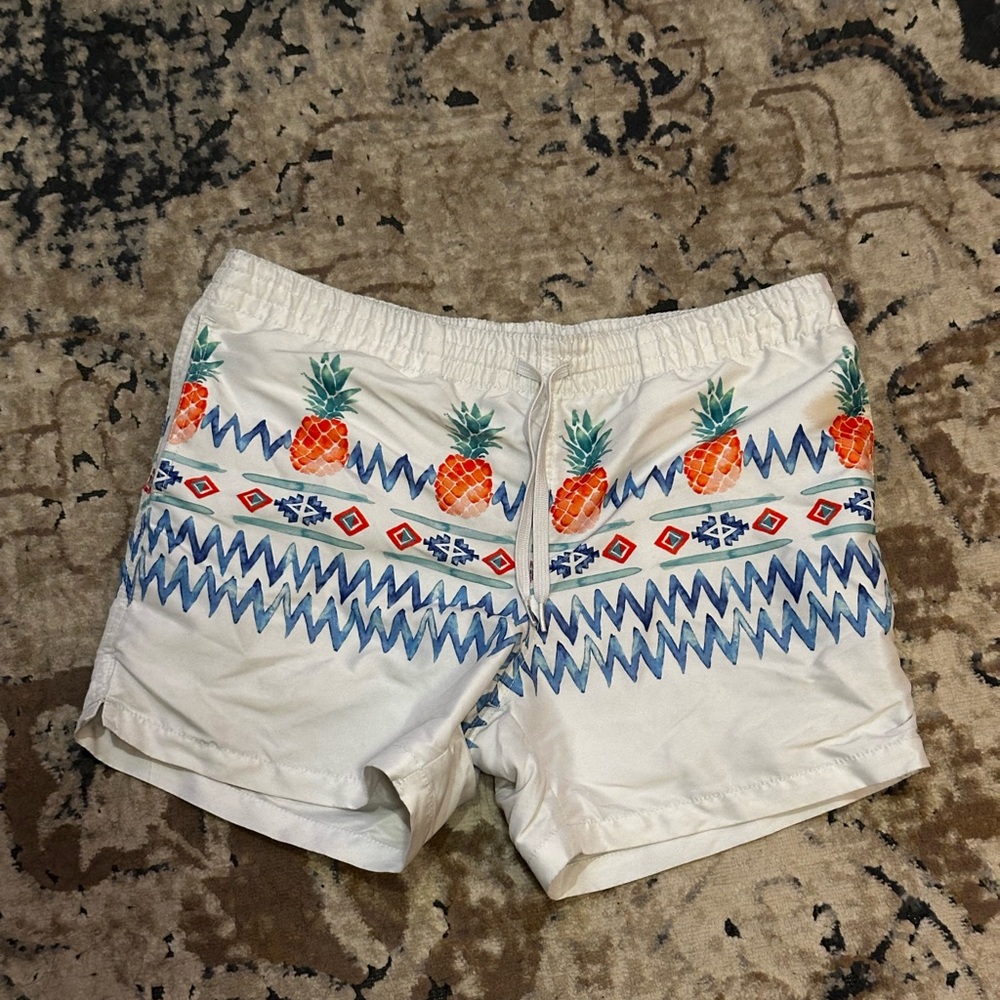 Chubbies White Swim Trunks with Pineapple and Blue Zigzag Pattern